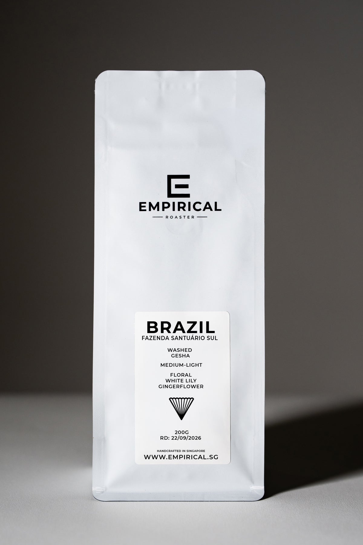 Empirical Brazil Gesha coffee bag, standing front angle, light roast washed